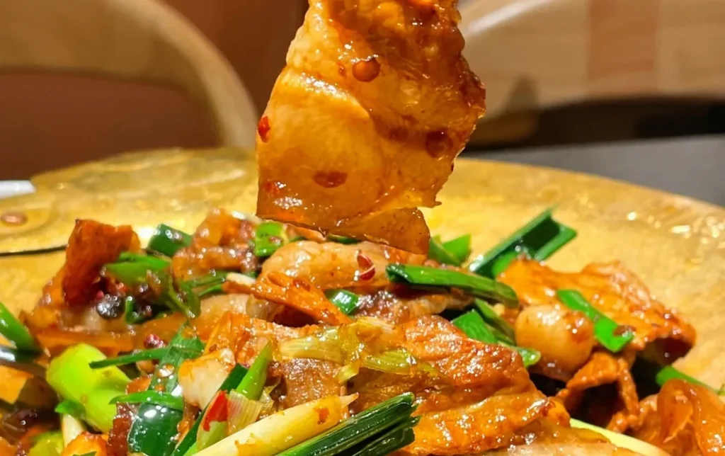 Authentic Chengdu huiguorou twice cooked pork belly with leeks and spicy sauce classic Sichuan dish