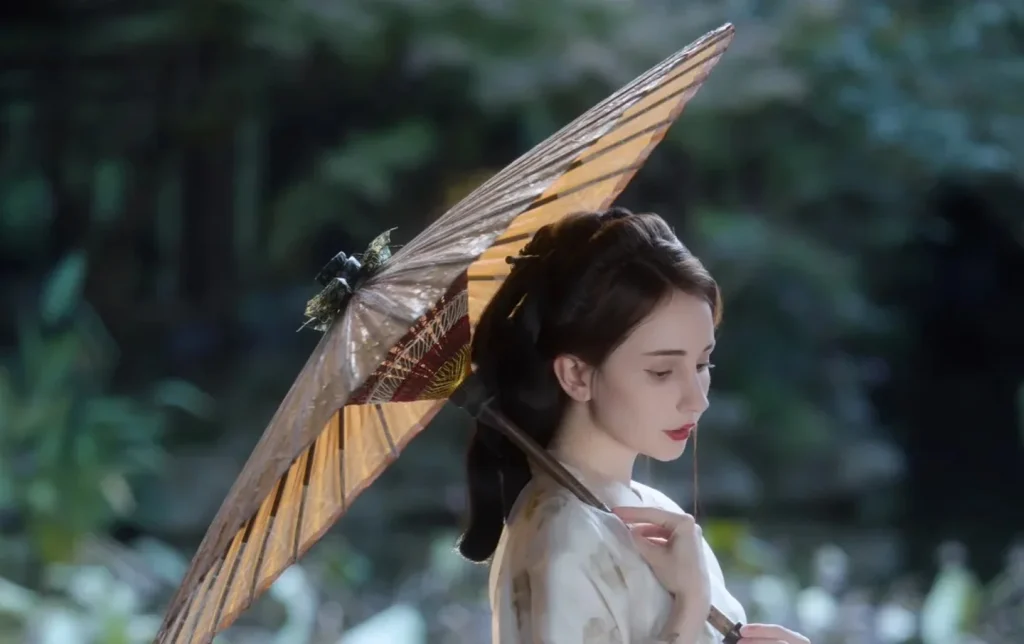 Foreign woman in an elegant white hanfu traditional Chinese dress holding an oil-paper umbrella (yousanjin) on a garden balcony, experiencing Tang dynasty costume culture in Xi'an