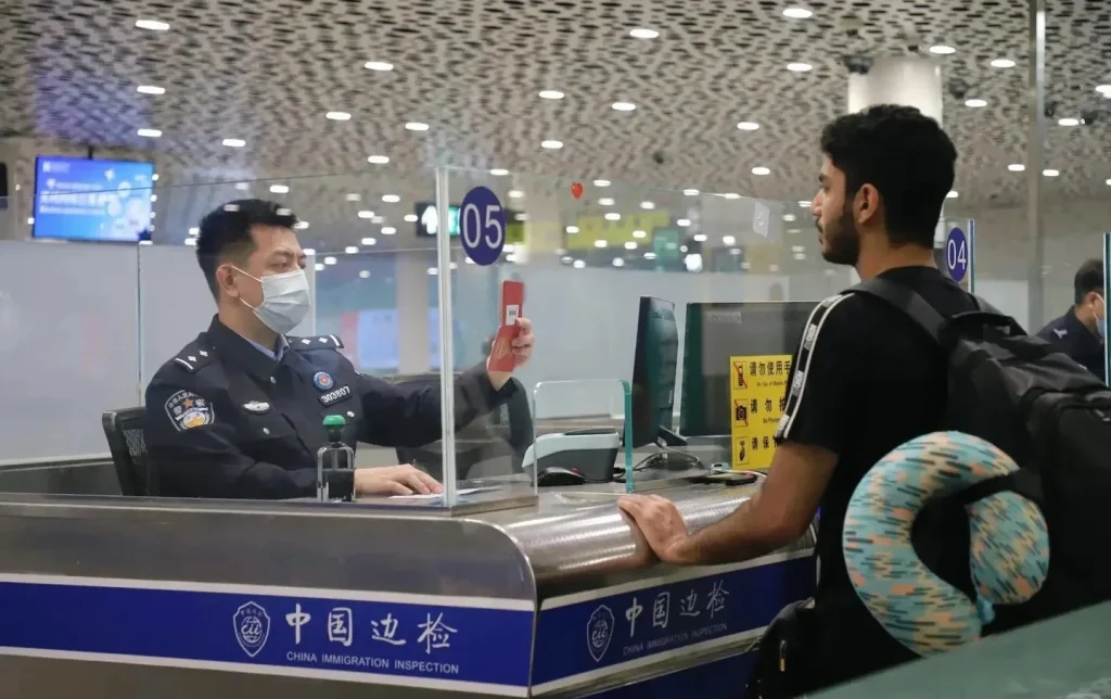 China Immigration Inspection counter at Shenzhen airport, a key entry point on guided China inbound tours