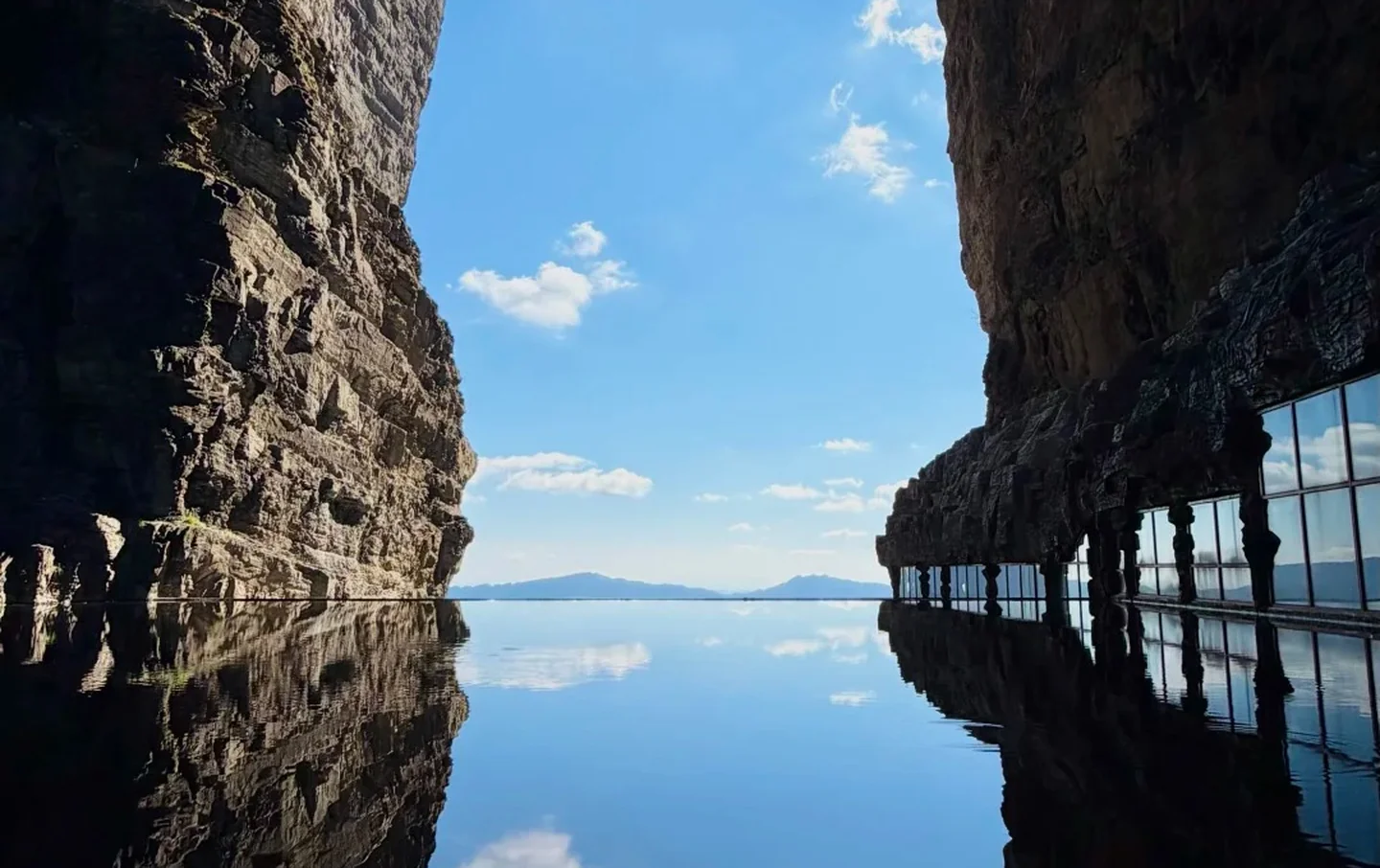 Mirror-like reflection lake inside Tianmen Mountain, a unique photo spot on Zhangjiajie private tours